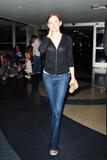 th_78619_Preppie_-_Rose_McGowan_arrives_into_LAX_Airport_-_August_22_2009_156_122_415lo.jpg