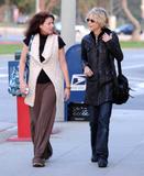 th_56370_Preppie_-_Debra_Messing_and_Meg_Ryan_out_for_lunch_in_Brentwood_-_Jan._6_2010_130_122_528lo.jpg
